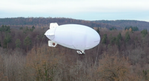 Simulation and Control of Deformable Autonomous Airships in Turbulent Wind